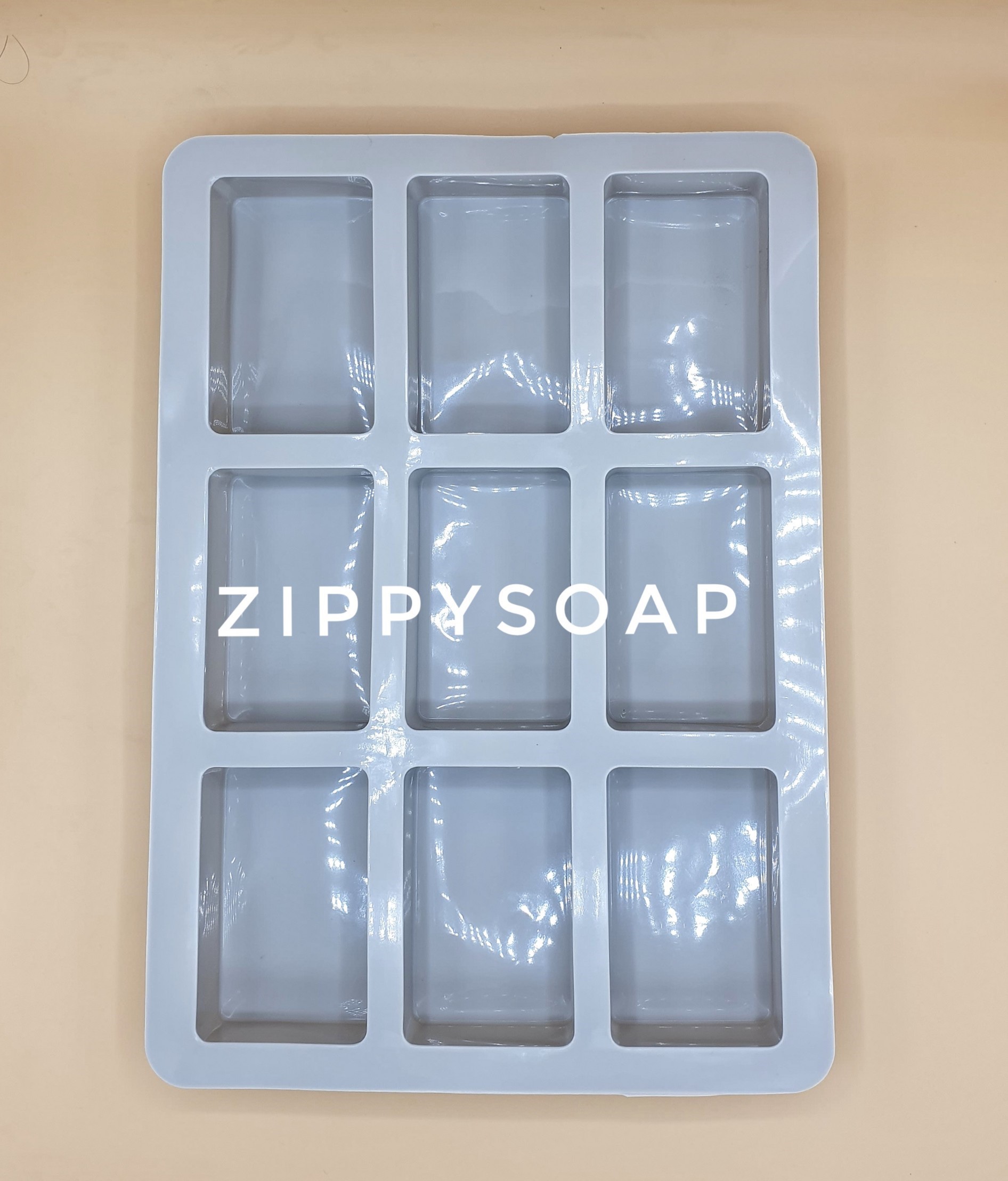 แม่พิมพ์ซิลิโคนสี่เหลี่ยมผืนผ้า 9ช่อง 90g 006805 6*9*1.5 CM