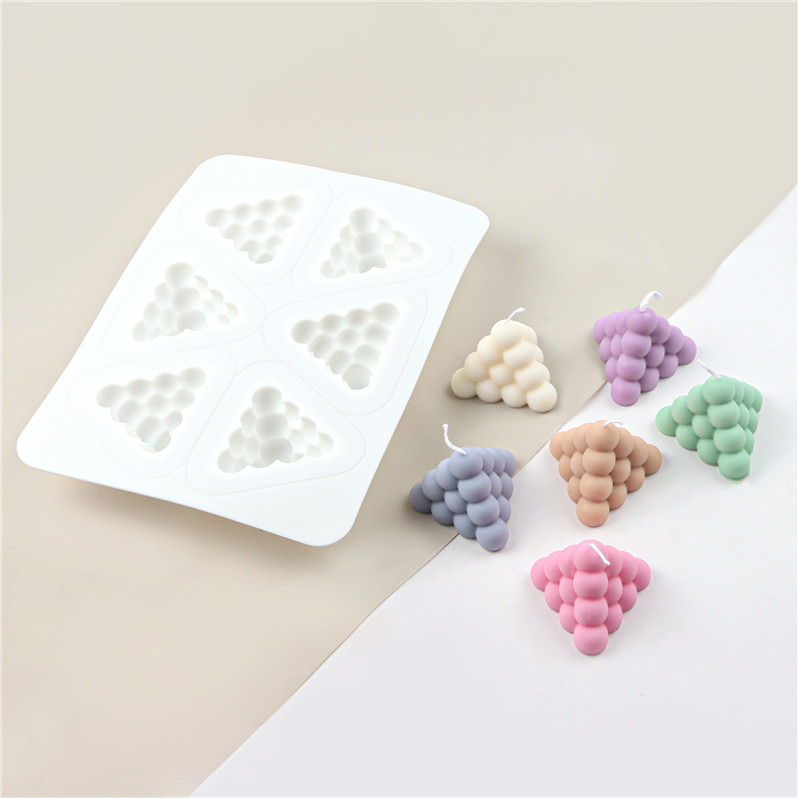 แม่พิมพ์ซิลิโคน ทำเทียน พีระมิด 6 ช่อง 7*4.9 cm 65 g. 007151
