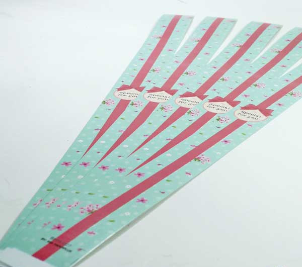 สายคาดกล่องลายดอกไม้สีฟ้าคาดแดง 2.2x31.3 cm. 50 ชิ้น