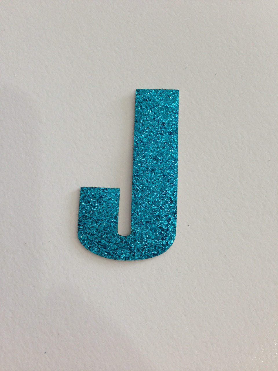 ตัวรีดอักษรกากเพชร สีฟ้า (5cm) ตัวอักษร J