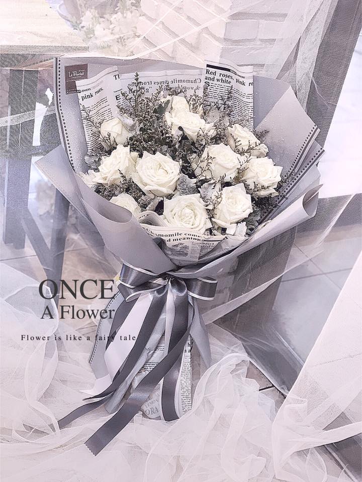 12 Import White Roses Bouquet with Newspaper & Grey Wrapping