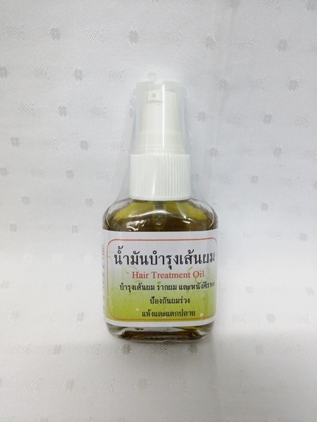 น้ำมันสมุนไพร "บำรุงเส้นผม" บรรจุขวดๆ ละ 25 ซีซี.