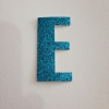 ตัวรีดอักษรกากเพชร สีฟ้า (5cm) ตัวอักษร E
