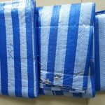 ผ้าใบ เคลือบ1ด้าน ฟ้าขาว ขนาดกว้าง 2 เมตร x ยาว 9 เมตร ฟ้าล้วน ผ้าฟางริ้ว รังสิต ปทุมธานี คลุมสินค้า กันสาด กันฝุ่น กันฝน กันแดด คลุมงานก่อสร้าง น้ำหนักเบา ทนทาน