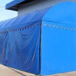 เต็นท์โกดังเก็บสินค้า กว้าง 15 เมตร ยาว 20 เมตร สูง 2.5 เมตร มีผ้าใบปิดล้อม 4 ด้าน เต็นท์ทรงโค้ง เต็นท์อุตสาหกรรม เต็นท์โรงงานเก็บสินค้า เต็นท์โกดังเช่าเก็บสินค้า เต็นท์โรงงานเก็บสินค้า