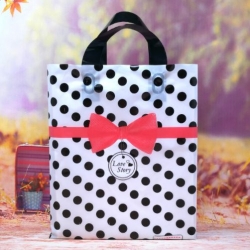 ถุงกระเป๋าขยายข้างสีขาวจุดดำคาดโบว์ 25x35x7 cm. 50 ชิ้น